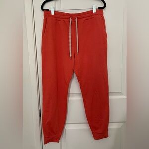 Vuori orange performance joggers